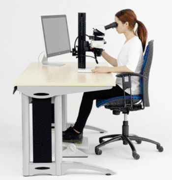 Image: Ergonomical design of the microscope and workstation contributes considerably to reducing strain. (Photo courtesy of Leica Microsystems).